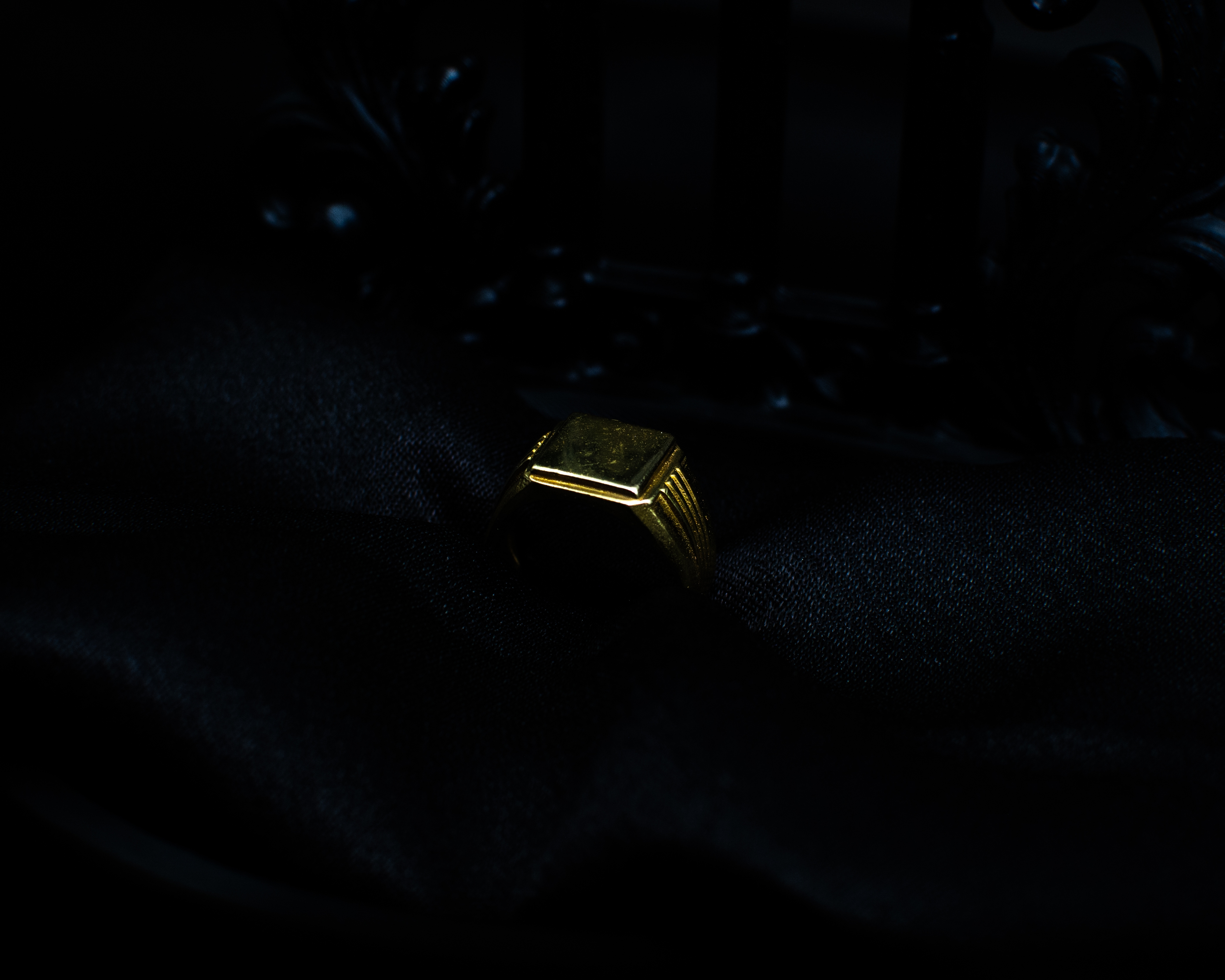 Gold Signet Ring 1 support view on black satin