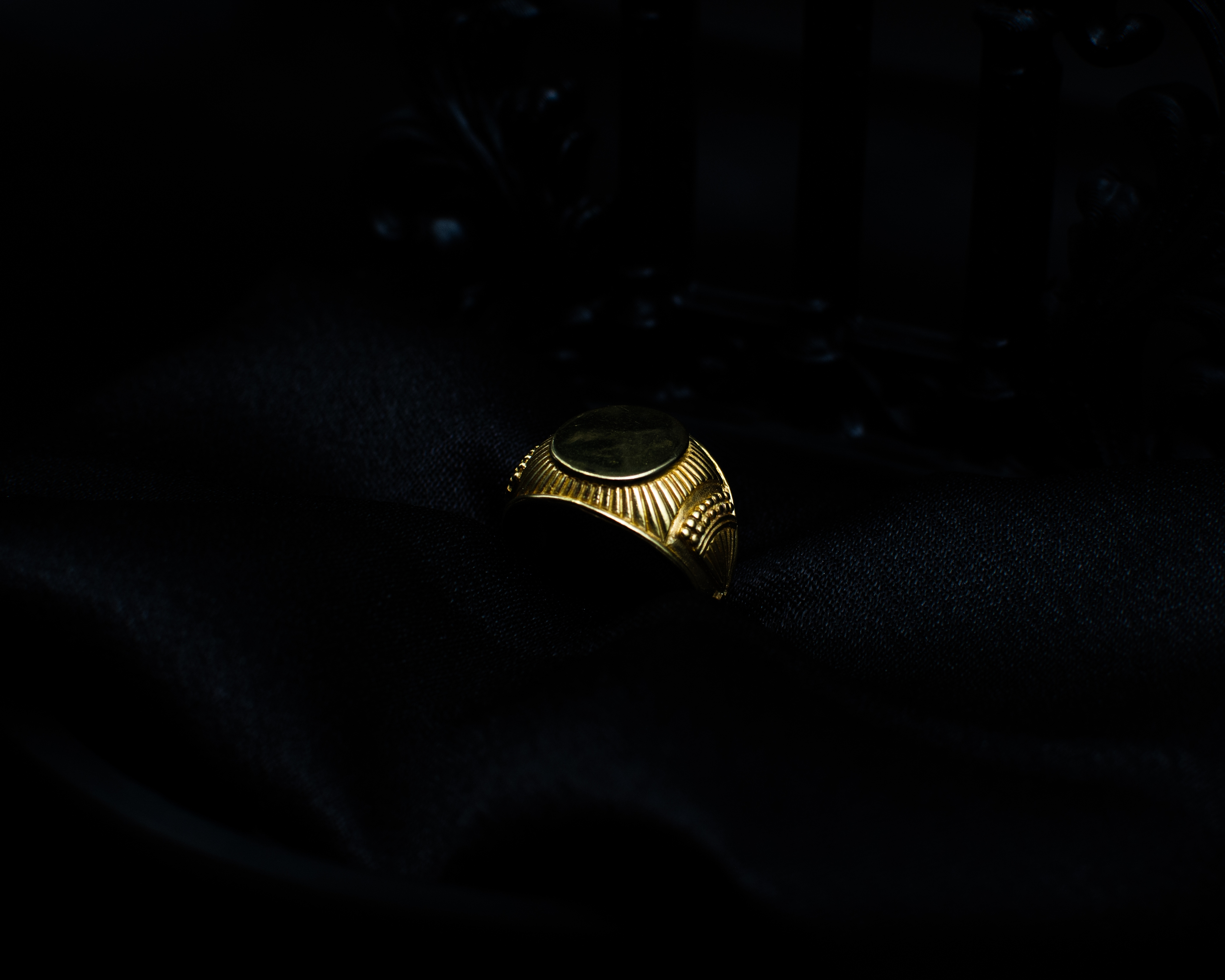 Gold Signet Ring 2 support view on black satin